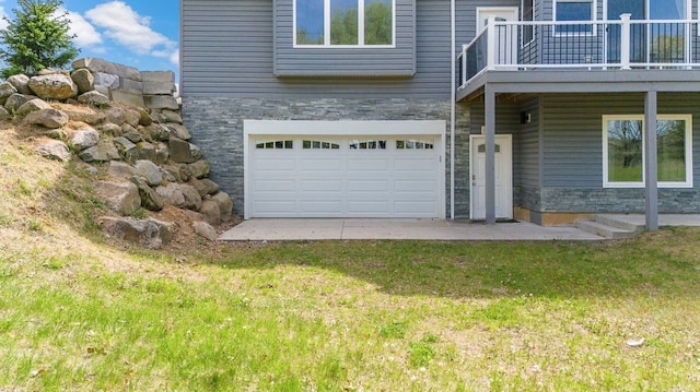 12150 Shaffer Rd, Davisburg, MI 48350 - view of home's exterior with stone siding, a garage, a yard, and a balcony
