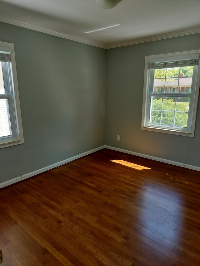 9909 Brookfield St, Livonia, MI 48150 - unfurnished room featuring ornamental molding, dark wood-style floors, and baseboards