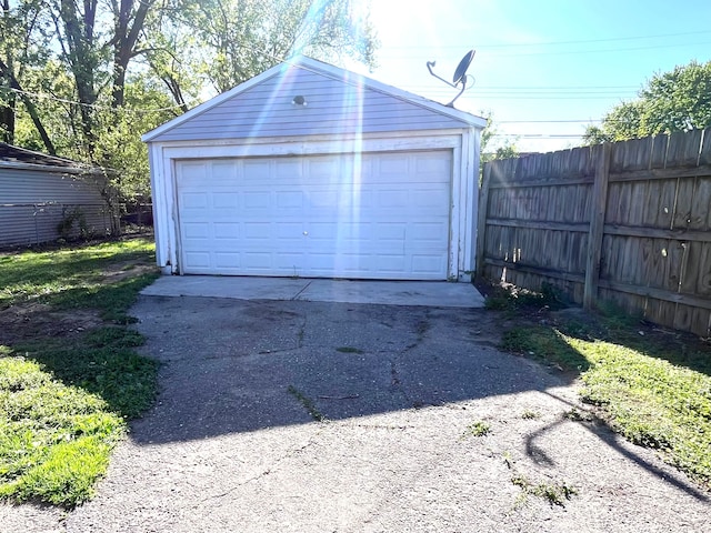 detached garage with fence