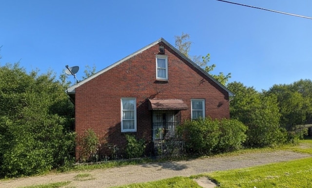 11301 Coyle St, Detroit, MI 48227 - view of side of property with brick siding