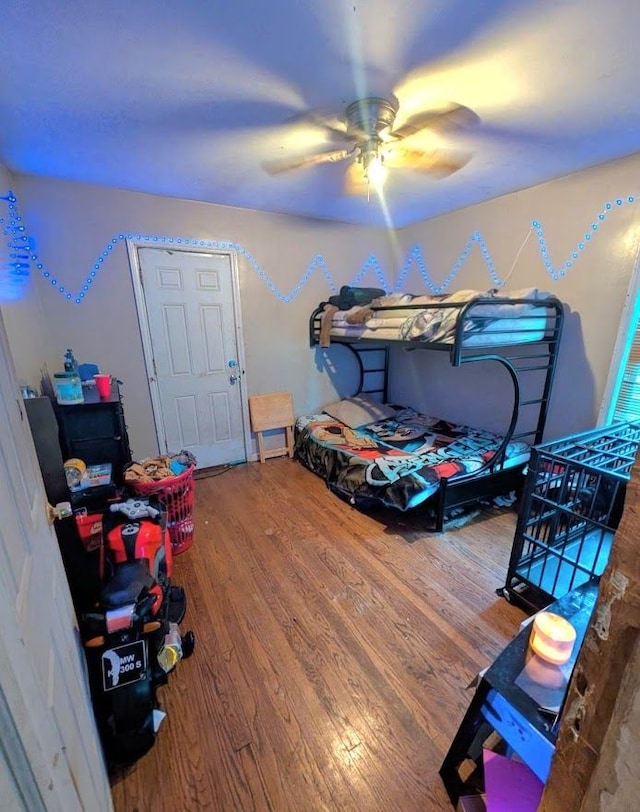 11301 Coyle St, Detroit, MI 48227 - bedroom featuring wood finished floors and a ceiling fan