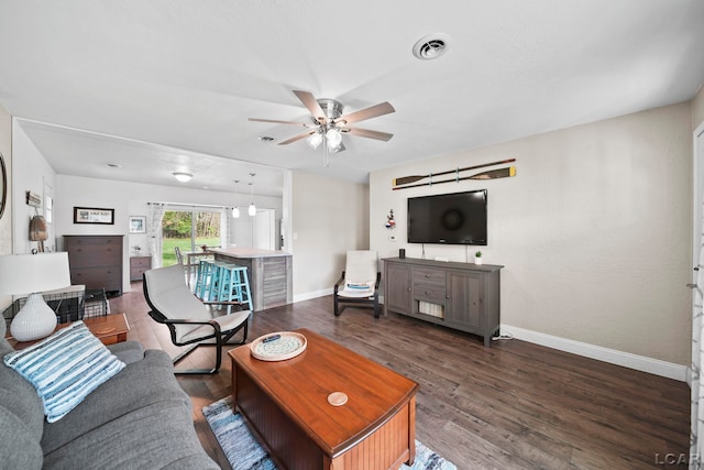 5541 Pleasant Valley Rd, Manitou Beach, MI 49253 - living room featuring a ceiling fan and wood finished floors