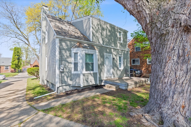 15470 Murray Hill St, Detroit, MI 48227 - view of front of home featuring a chimney