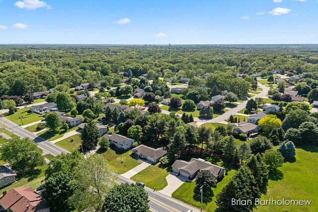 2657 Leffingwell Ave NE, Grand Rapids, MI 49525 - aerial perspective of suburban area with a forest