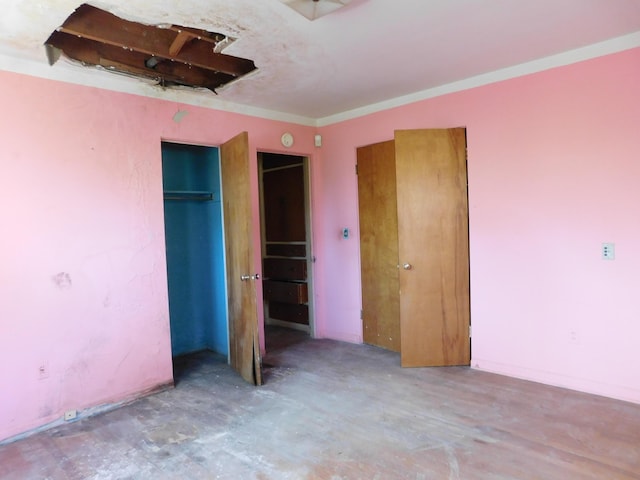 unfurnished bedroom with a closet