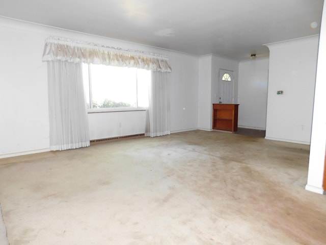 empty room with baseboards