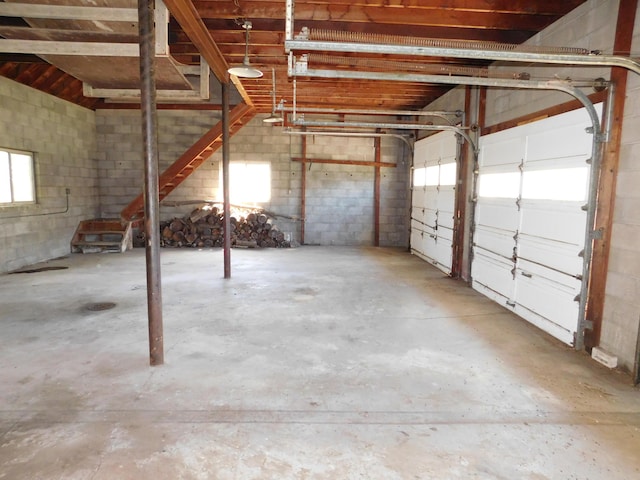 garage featuring concrete block wall