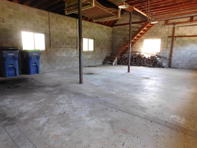 below grade area with concrete block wall