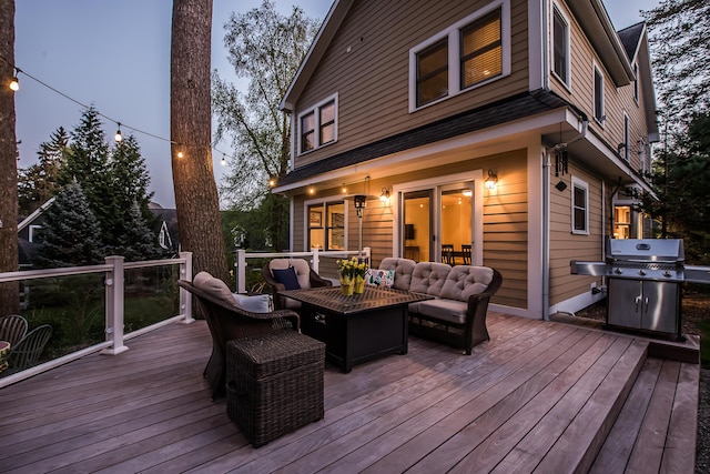 deck featuring area for grilling and an outdoor hangout area