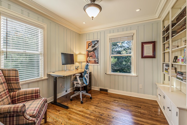 office featuring ornamental molding, plenty of natural light, wood finished floors, and baseboards