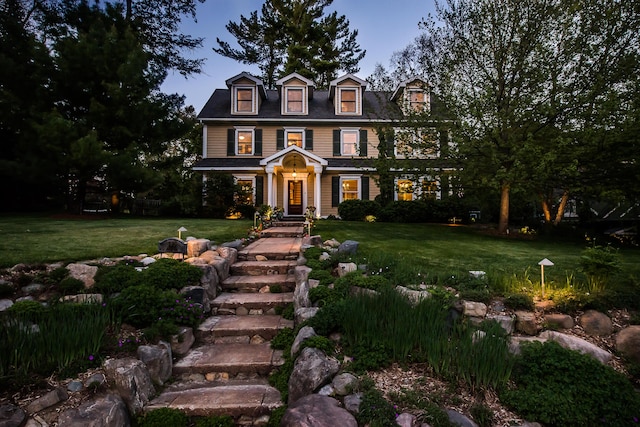 view of front of house with a front yard