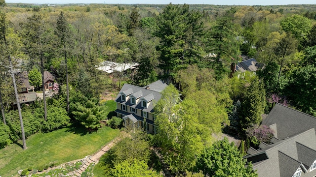 drone / aerial view of a heavily wooded area