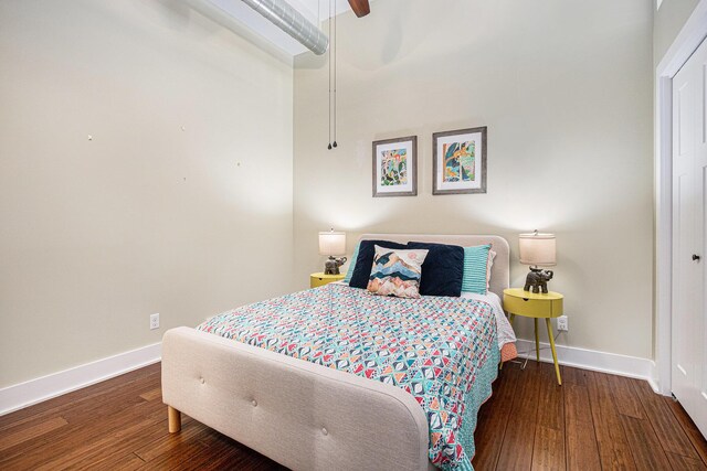 2214 S State St Unit 108, Saint Joseph, MI 49085 - bedroom featuring baseboards, wood finished floors, and a ceiling fan