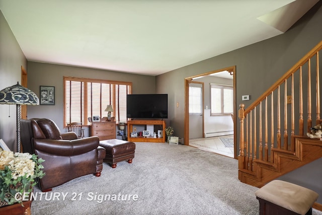 919 E Salzburg Rd, Bay City, MI 48706 - living room with baseboard heating, stairway, and carpet floors