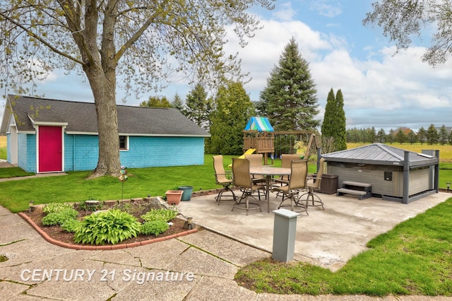 919 E Salzburg Rd, Bay City, MI 48706 - view of patio featuring a playground and a hot tub
