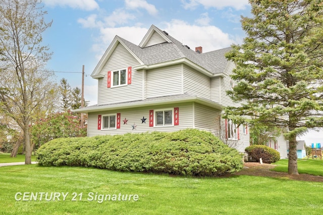 919 E Salzburg Rd, Bay City, MI 48706 - view of front of property featuring a shingled roof, a front yard, and a chimney