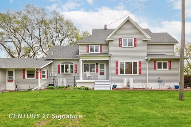 919 E Salzburg Rd, Bay City, MI 48706 - rear view of house featuring a yard and roof with shingles