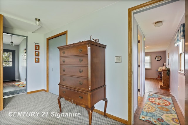 919 E Salzburg Rd, Bay City, MI 48706 - hallway featuring baseboards and light carpet