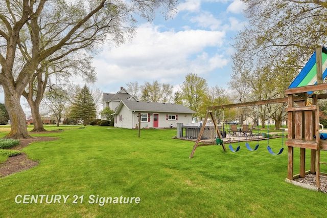 919 E Salzburg Rd, Bay City, MI 48706 - view of green lawn with a playground