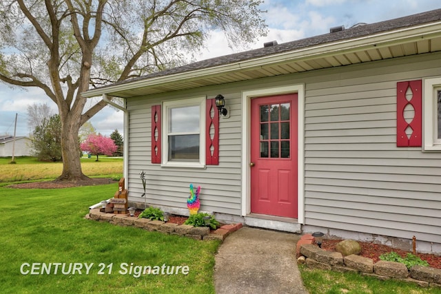 919 E Salzburg Rd, Bay City, MI 48706 - view of exterior entry with a lawn