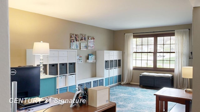 office featuring mail area and baseboards