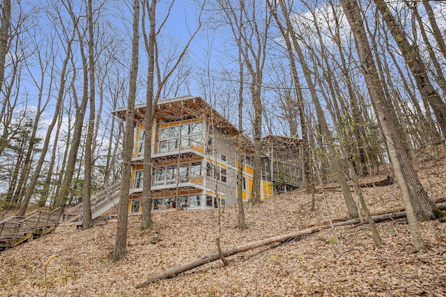 6723 Vandermeulen Rd, Holland, MI 49423 - back of house with stairway