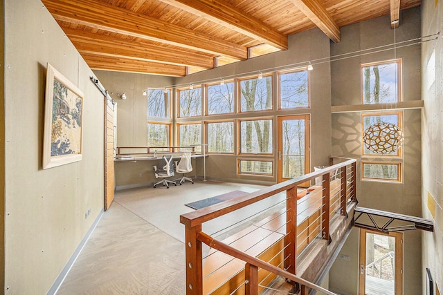 6723 Vandermeulen Rd, Holland, MI 49423 - hall featuring wooden ceiling, plenty of natural light, beamed ceiling, baseboards, and an upstairs landing