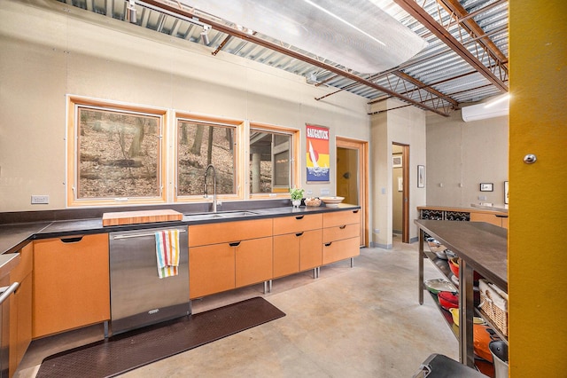 6723 Vandermeulen Rd, Holland, MI 49423 - kitchen with a sink, concrete floors, dishwasher, and dark countertops
