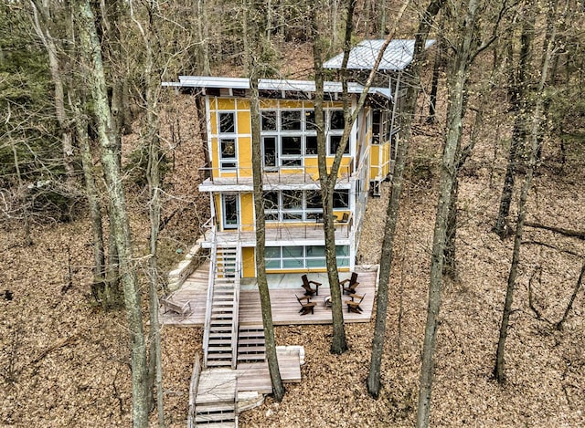 6723 Vandermeulen Rd, Holland, MI 49423 - back of property with stairs and a balcony