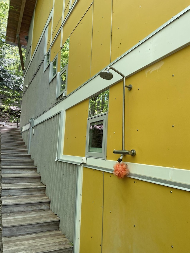 6723 Vandermeulen Rd, Holland, MI 49423 - view of side of property with stairway