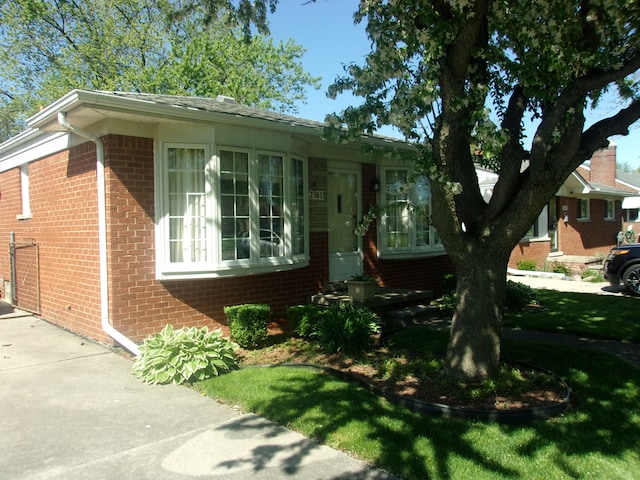 21613 Hoffman St, Saint Clair Shores, MI 48082 - view of front of property with brick siding