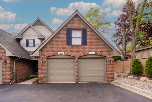 1612 Michael, Clawson, MI 48017 - view of front of property with brick siding, asphalt driveway, and a garage