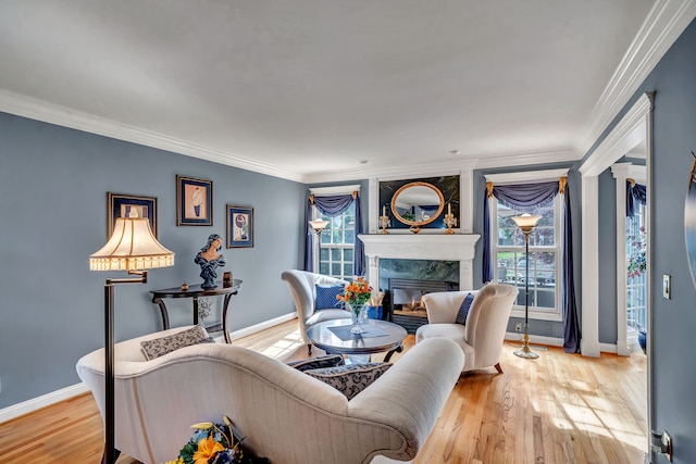 1612 Michael, Clawson, MI 48017 - living area with a high end fireplace, plenty of natural light, ornamental molding, and wood finished floors
