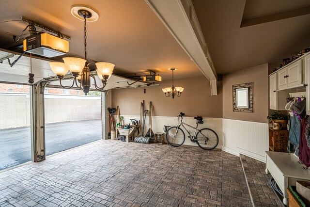 1612 Michael, Clawson, MI 48017 - garage featuring a garage door opener and a wainscoted wall