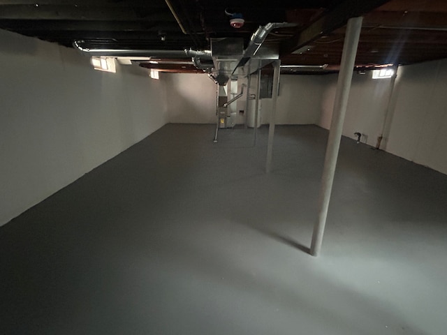 below grade area featuring heating unit