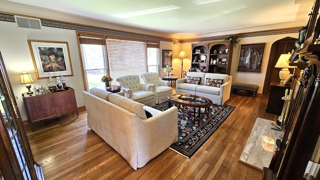 28051 Garfield St, Roseville, MI 48066 - living room featuring dark wood-style flooring