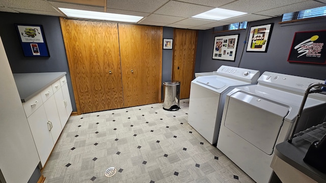 28051 Garfield St, Roseville, MI 48066 - clothes washing area with washing machine and dryer, cabinet space, and light floors