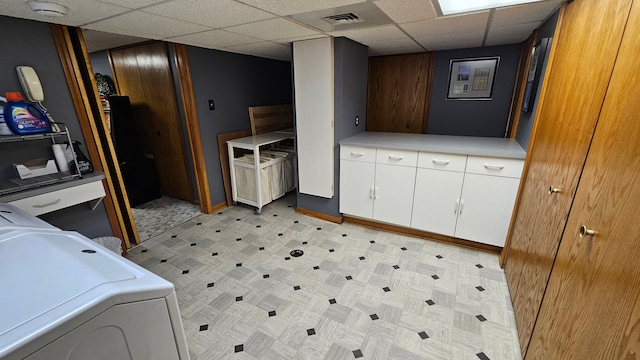 28051 Garfield St, Roseville, MI 48066 - clothes washing area with cabinet space, washing machine and clothes dryer, and baseboards