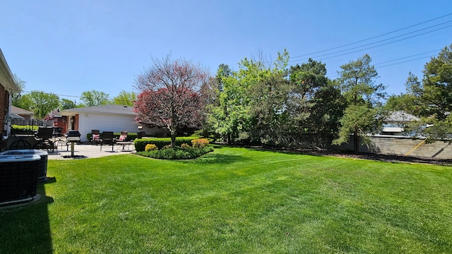 28051 Garfield St, Roseville, MI 48066 - view of yard featuring a patio area and central AC