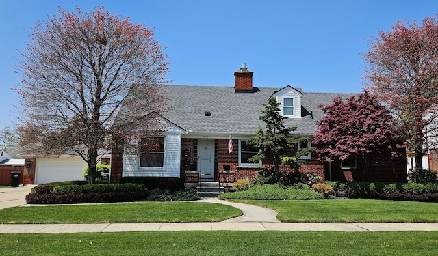 28051 Garfield St, Roseville, MI 48066 - cape cod house featuring brick siding, a chimney, roof with shingles, a front yard, and an attached garage