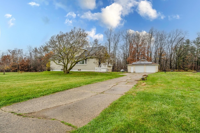 5189 W US Highway 12, Three Oaks, MI 49128 - view of green lawn featuring a garage and an outdoor structure