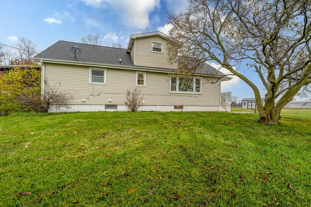 5189 W US Highway 12, Three Oaks, MI 49128 - back of property featuring a lawn and a shingled roof