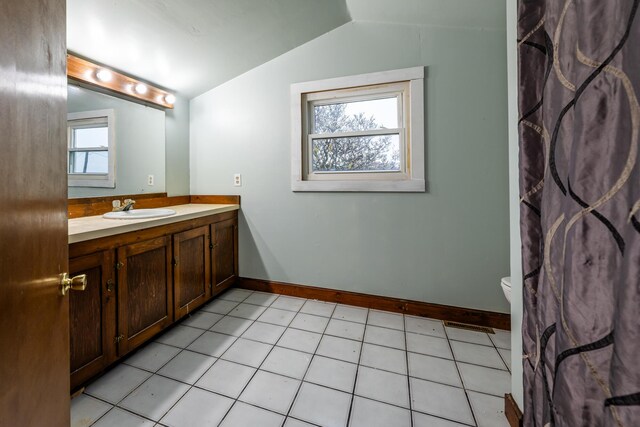 5189 W US Highway 12, Three Oaks, MI 49128 - bathroom with lofted ceiling, vanity, toilet, and baseboards