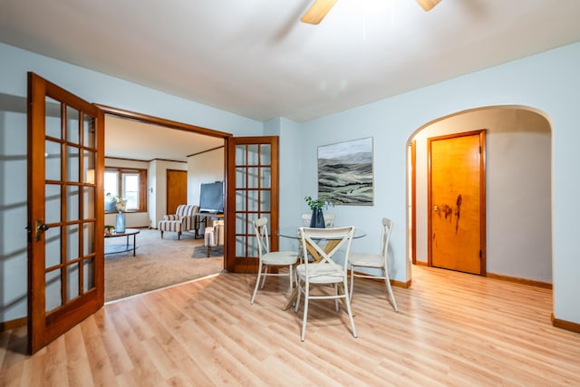 5189 W US Highway 12, Three Oaks, MI 49128 - sitting room with french doors, wood finished floors, ceiling fan, baseboards, and arched walkways