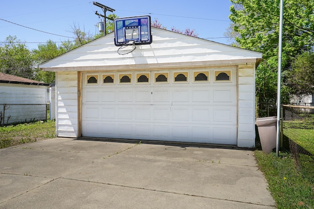 detached garage with fence