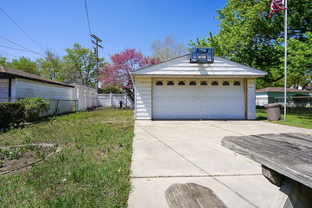 detached garage with fence