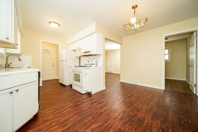 kitchen featuring a sink, white appliances, light countertops, white cabinets, and dark wood-style flooring