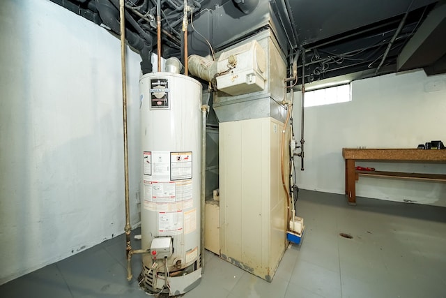 utility room featuring gas water heater