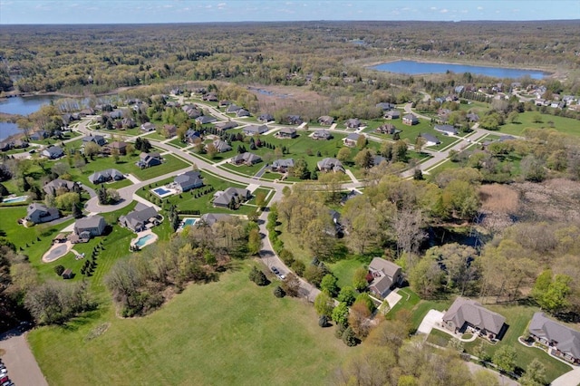1060 Tinley Blvd, Oxford, MI 48371 - aerial overview of property's location featuring a large body of water, a heavily wooded area, and nearby suburban area