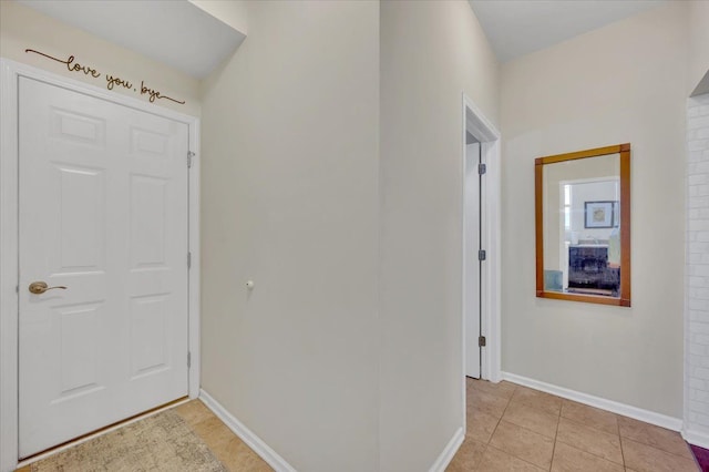 1060 Tinley Blvd, Oxford, MI 48371 - foyer with baseboards and light tile patterned floors